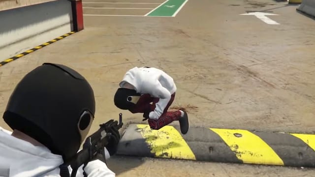Masked player in the foreground aiming a rifle at a second player crouched beside a yellow and black kerb on a rooftop car park.