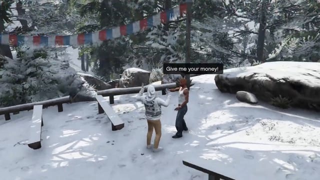 Player in a white hoodie with raised hands facing a man in a white vest under the speech bubble "Give me your money!", in a snowy clearing below a line of flags.