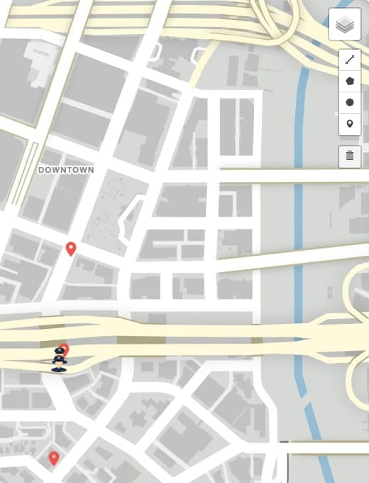 Dispatch map around Downtown with three red pins, two police unit markers on a road beside one of them, and layer, line, polygon, circle, marker and delete buttons at the right edge.