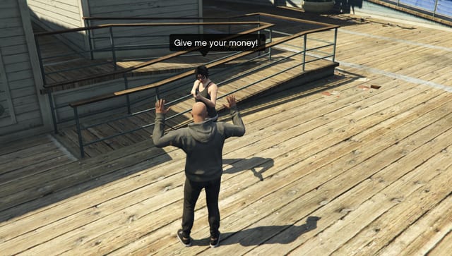 On a wooden pier, an NPC aims a pistol at a player with raised hands and says "Give me your money!".