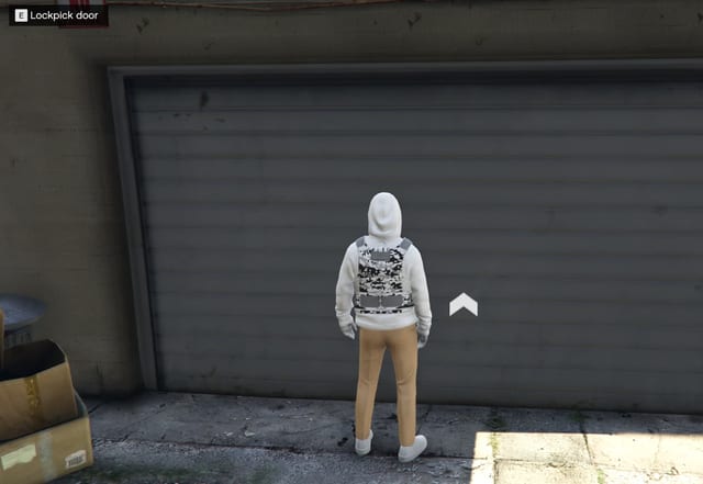 Player in front of a closed garage door with the prompt "E Lockpick door".