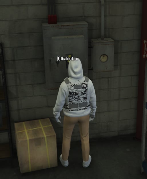 Player at an electrical panel with the prompt "[E] Disable alarm".
