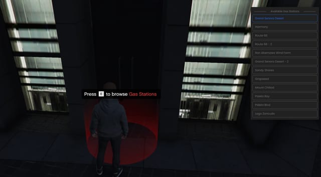 Player on a red marker with the prompt "Press E to browse Gas Stations" and a menu of available gas stations such as Grand Senora Desert and Harmony.