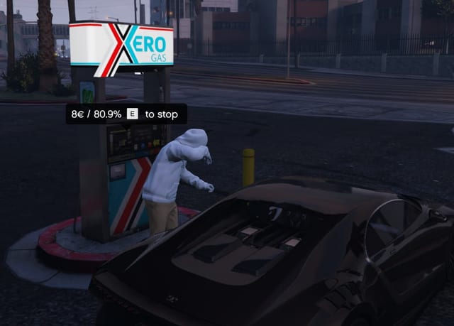 Player fuelling a sports car at a pump under a Xero Gas sign with the prompt "8 euros / 80.9% E to stop".