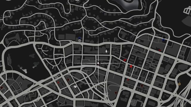Full-screen map of the city streets with small red, blue and white blips spread across it.