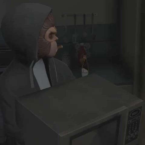 Hooded player in a monkey mask holding a microwave with its door and keypad towards the camera in a dark kitchen.