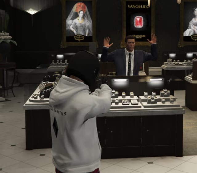Masked player aiming at a cashier with raised hands behind a jewelry counter.