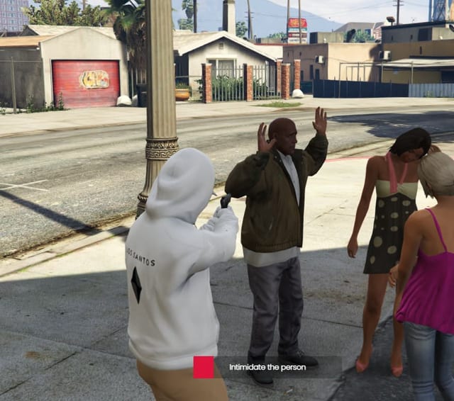 Player aiming a pistol at an NPC with raised hands, with an "Intimidate the person" bar.